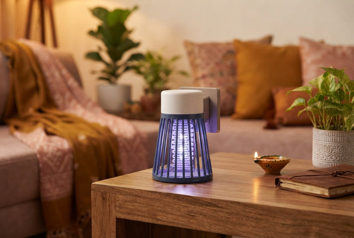 A modern electronic mosquito lamp glowing softly on a side table in a cozy, stylishly decorated living room.